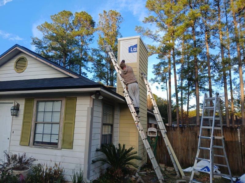 Exterior Home Siding Repair by Top 904 Gutters in Yulee, Florida.